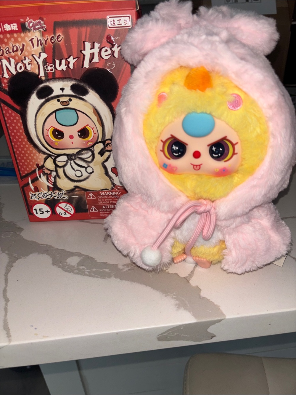 Baby Three Not Your Hero Plush Doll in Pink & Yellow